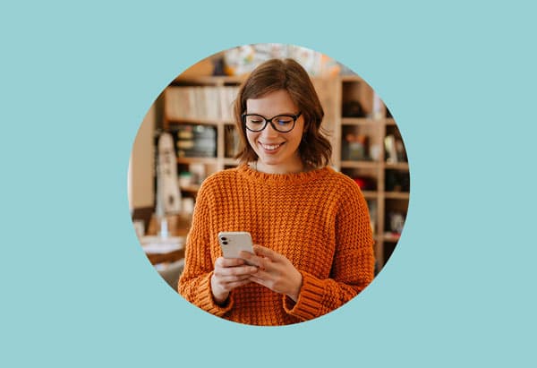 woman on smart phone viewing mobile web design